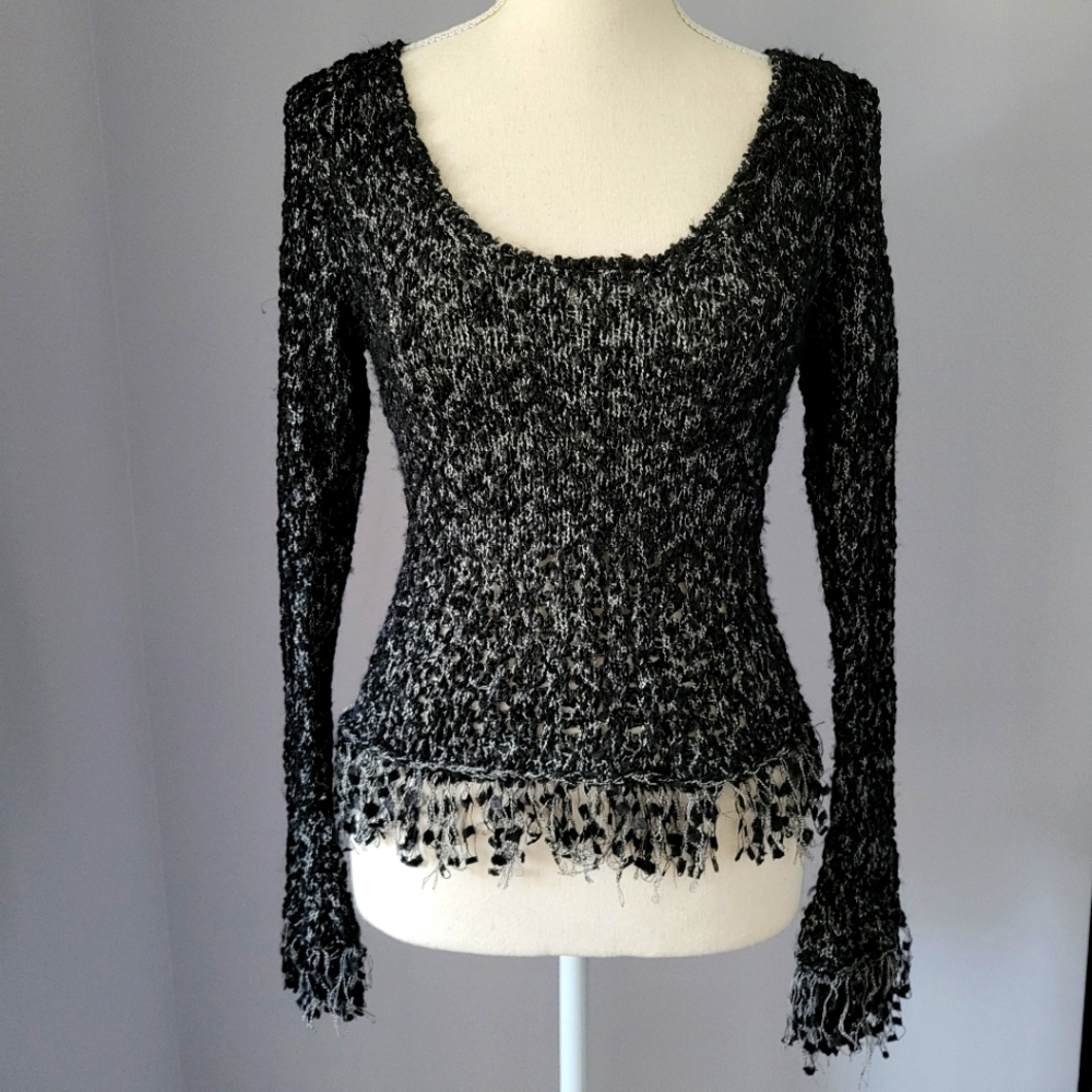 Marled knit fringe sweater